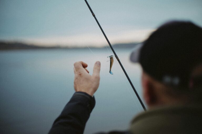 Casting a fishing line on Bull Shoals Lake — one of the best perks of moving to Mountain Home, Arkansas.