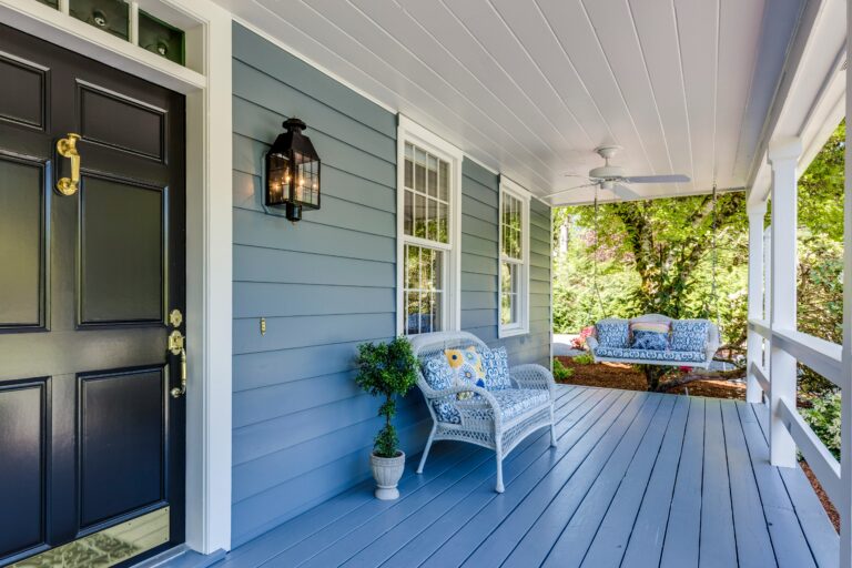 Cozy front porch on an Ozarks home, where the cost of living is hard to beat