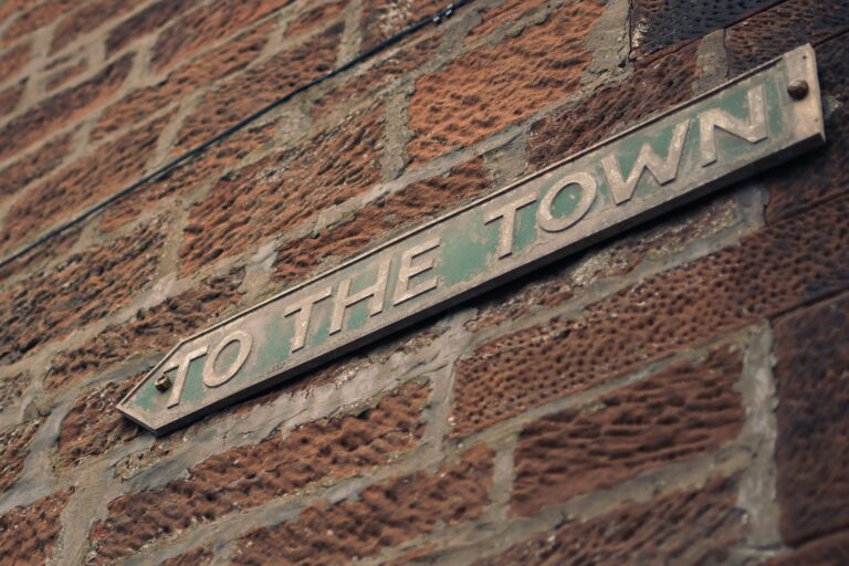 To the town